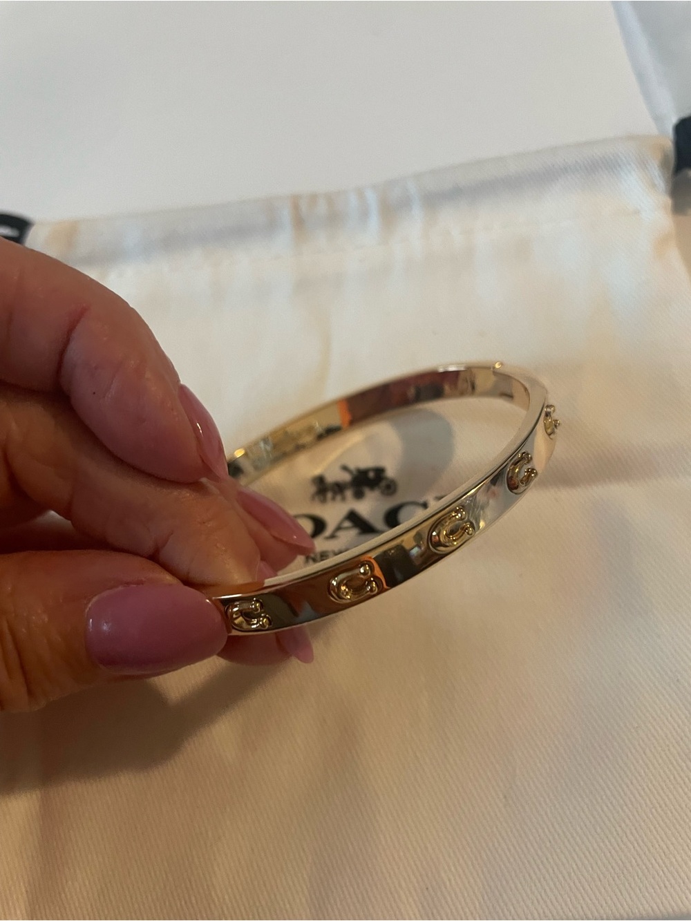 Coach Gold-Tone Rivet Bangle Bracelet